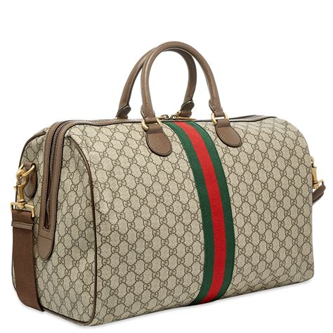 etichetta valigia gucci|Gucci duffle bags.